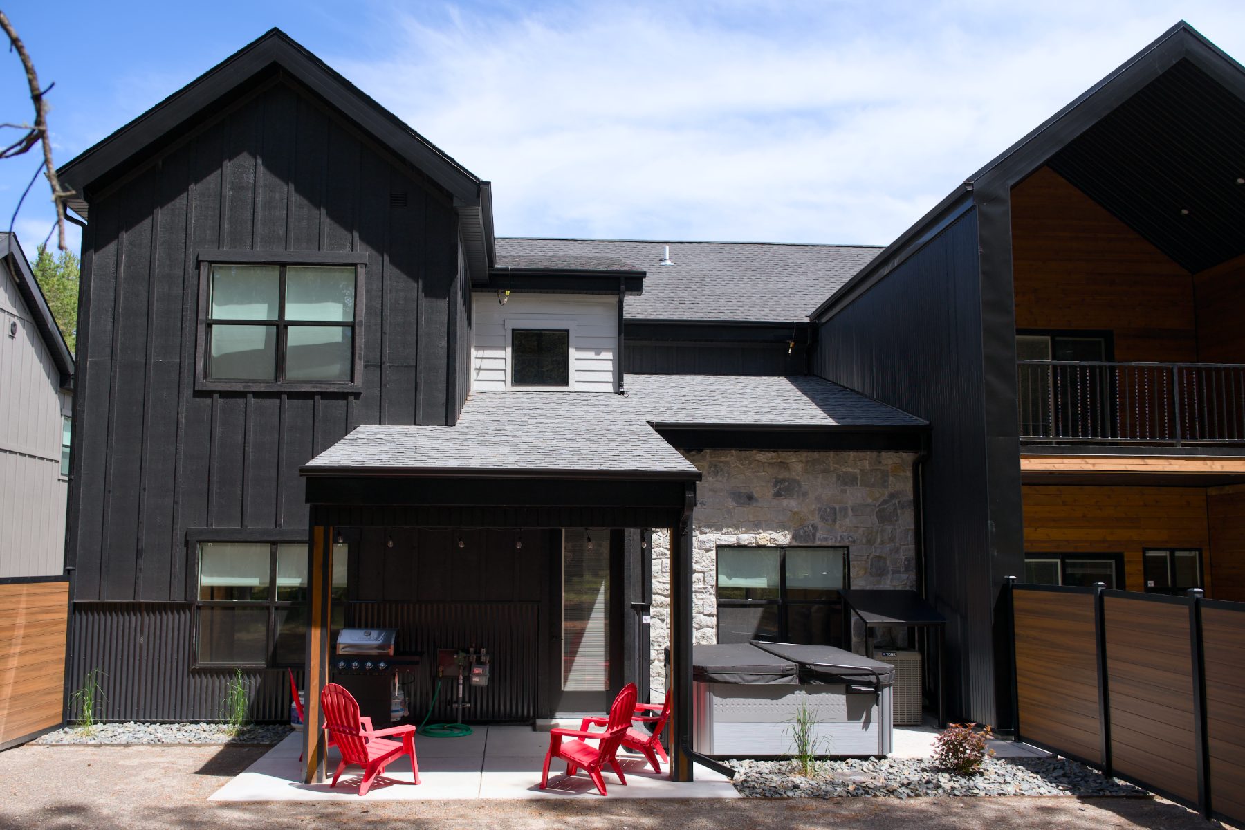 Red Dog Retreat exterior with private hot tub and patio seating